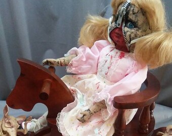 creepy rocking horse doll