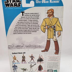 May include: A Star Wars Obi-Wan Kenobi action figure on a blue and white card. The card features the Star Wars and Clone Wars logos, along with text describing the animated series. The back of the card shows other characters to collect.