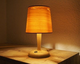 Wooden bedside lamp with cone shade | Natural reading lamp from larch wood | Design lamp with custamizable fabric cabel