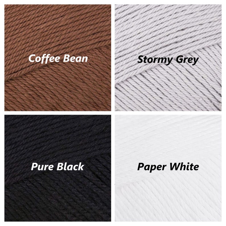 May include: Four yarn skeins in different colours: Coffee Bean, Stormy Grey, Pure Black, and Paper White.