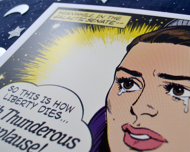 May include: A comic book style illustration of a woman with tears in her eyes. The text in the image reads "MEANWHILE, IN THE GALACTIC SENATE-- SO THIS IS HOW LIBERTY DIES... Thunderous plause!"