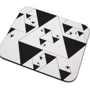 May include: Black and white mouse pad with a geometric pattern of overlapping triangles. The pattern creates an optical illusion of depth and dimension.