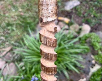 Hazel hiking stick. Straight and strong 44.5” long with a spiral carved into its shaft. Topped with domed thumbrest & rubber ferrule at base