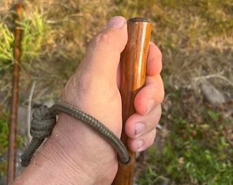 Matched pair chestnut Hiking Sticks (44”&42”) paracord wrist straps, smooth shafts, recessed compasses at tops and stainless steel ferrules