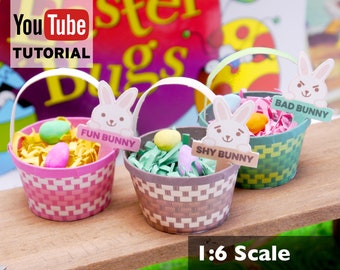 May include: Three miniature Easter baskets with bunny faces and names, "Fun Bunny", "Shy Bunny", and "Bad Bunny". Each basket is filled with pastel-colored shredded paper and candy eggs. The baskets are 1:6 scale.