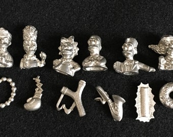12 Vintage Pewter Clue Pieces from a Simpsons-Themed Clue Game
