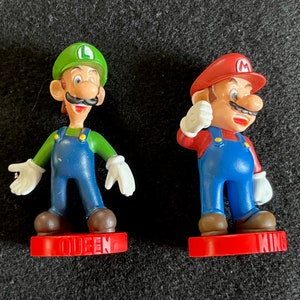 Plastic Action Figures from a Mario Brothers-Themed Checkers Game