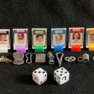Office-Themed Clue Game with Nine Murder Weapons and Tokens for Six Office Characters Plus Dice with a Question Mark on One Side