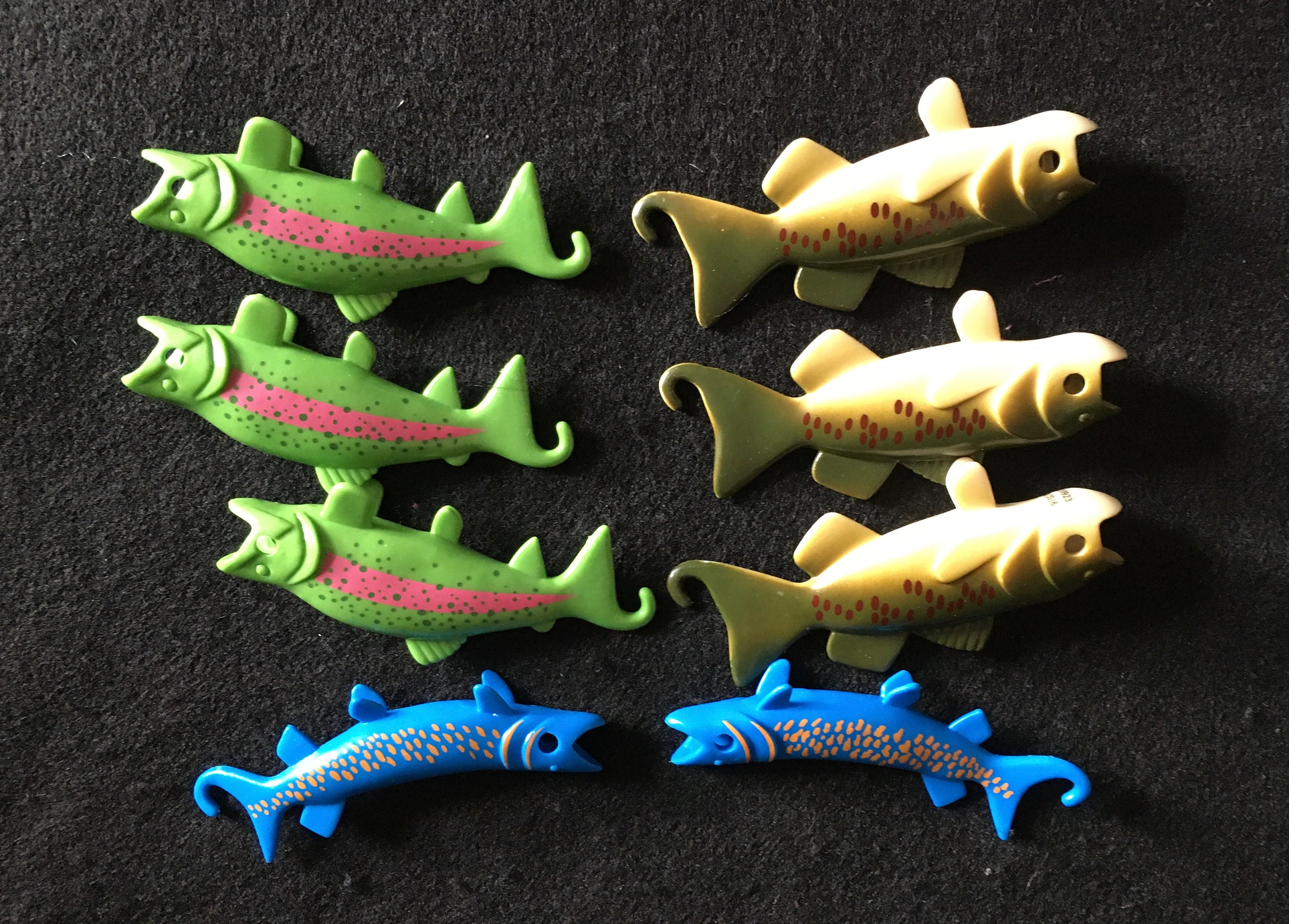 Eight Semi-hard Plastic Hooky Fish From From a Linking Fish Game -   Canada