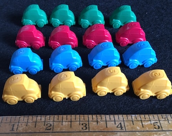 16 Plastic Little Bug-Like Taxi Playing Pieces from a British Taxi Board Game -- Red, Yellow, Blue and Green