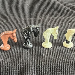 Four Horse Head Playing Tokens from a Horse-Themed Board Game. 1.75&quot; Tall.