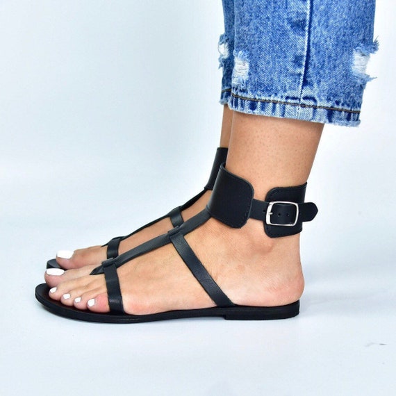Buy > flat black ankle strap sandals > in stock