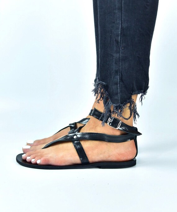 black flat sandals with ankle strap