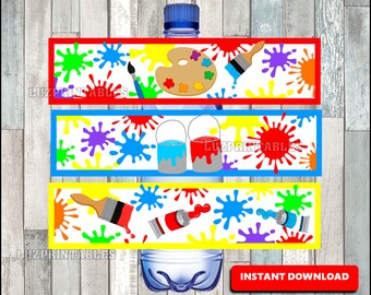 May include: Three printable water bottle labels with a paint splatter theme. The labels feature paintbrushes, paint tubes, paint palettes, and paint buckets. The labels are in red, blue, and yellow.