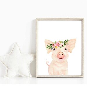 May include: A watercolour painting of a pink pig wearing a flower crown. The pig is smiling and looking at the viewer. The background is white.