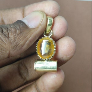 Oval Yellow Sapphire Pendant: Natural Gemstone in Panchdhatu Taweez