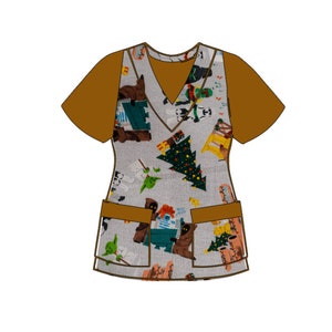 May include: A brown and gray scrub top with a V-neck and short sleeves. The top features a print of various Star Wars characters and Christmas-themed imagery.
