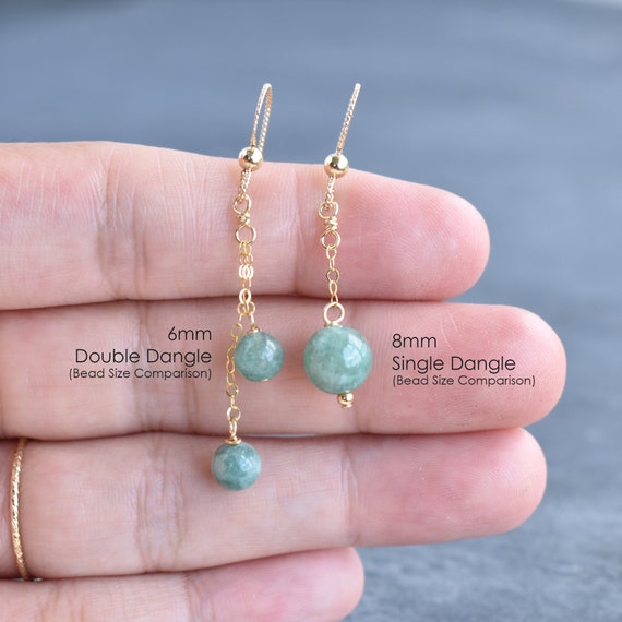 Dangling jade earrings deals