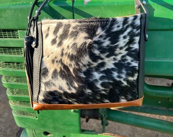 one of a kind tote bag, hair on hide with braided reins for straps