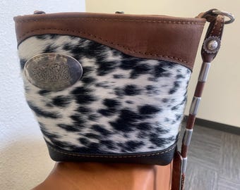 one of a kind, hair on hide bag with horse tack strap