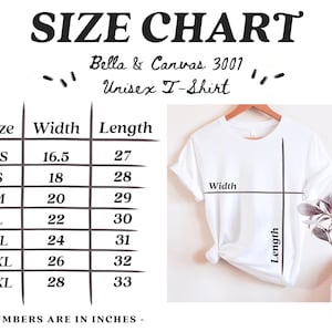 Puede incluir: Una camiseta unisex blanca Bella & Canvas 3001 en una percha, con una tabla de tallas. La tabla muestra tallas XS a 3XL, con medidas de ancho y largo en pulgadas. El texto "SIZE CHART" est&aacute; en la parte superior.