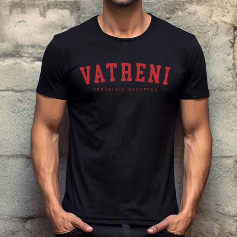 May include: A black t-shirt with the text "VATRENI" in red letters and the text "REPUBLIKA HRVATSKA" in smaller red letters below.