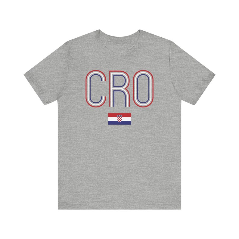 May include: A gray t-shirt with the word "CRO" in red, white, and blue stripes. The Croatian flag is below the word.
