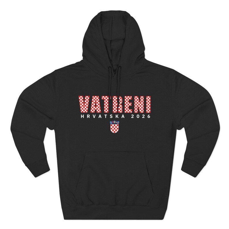May include: Black hooded sweatshirt with the word "VATRENI" in a red and white checkered pattern. Below the word is "HRVATSKA 2026" and a Croatian coat of arms. The sweatshirt has a drawstring hood and long sleeves.