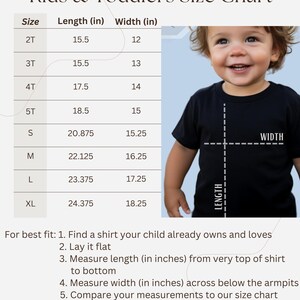 May include: A size chart for kids and toddlers, with measurements in inches. The chart includes sizes 2T to XL, with corresponding length and width measurements. A child in a black t-shirt is shown, with dotted lines indicating length and width measurements.