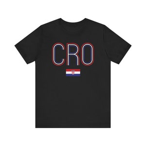 May include: Black t-shirt with a white outline of the word "CRO" in blue and red. The Croatian flag is below the word.
