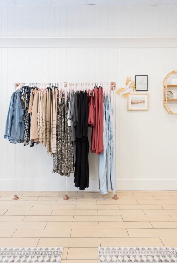 Clothing rod for wall hot sale
