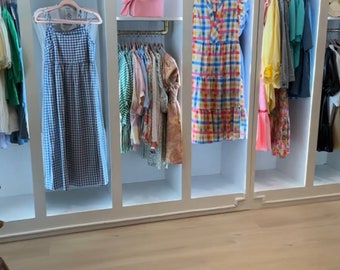 Light up built in closet clothing display