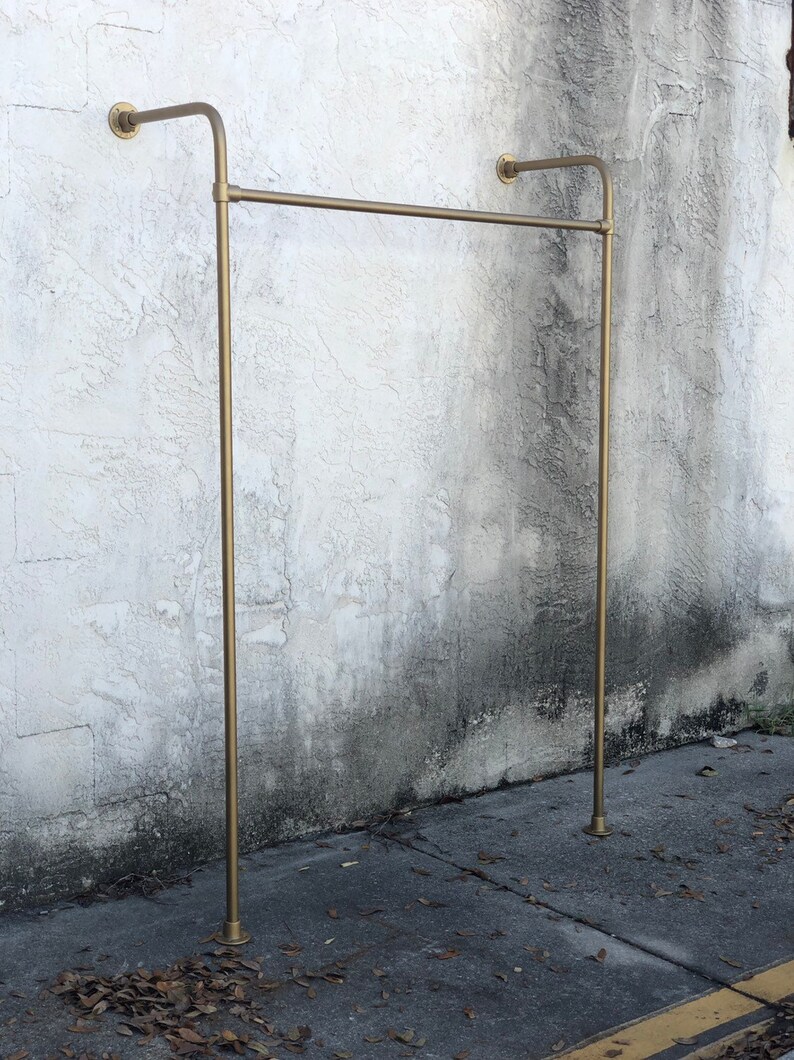 Gold wall mounted curved clothing rack Etsy