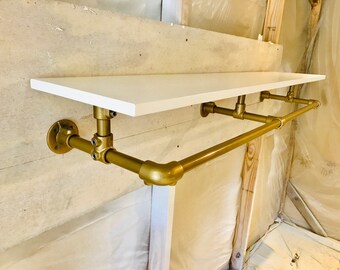 Wall mounted shelf with gold rack