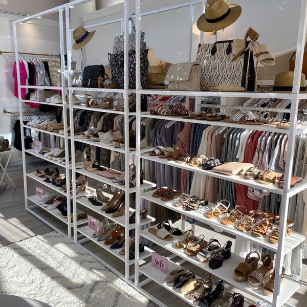 Double sided shelving and clothing rack unit