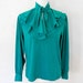 see more listings in the Tops en Blouses section