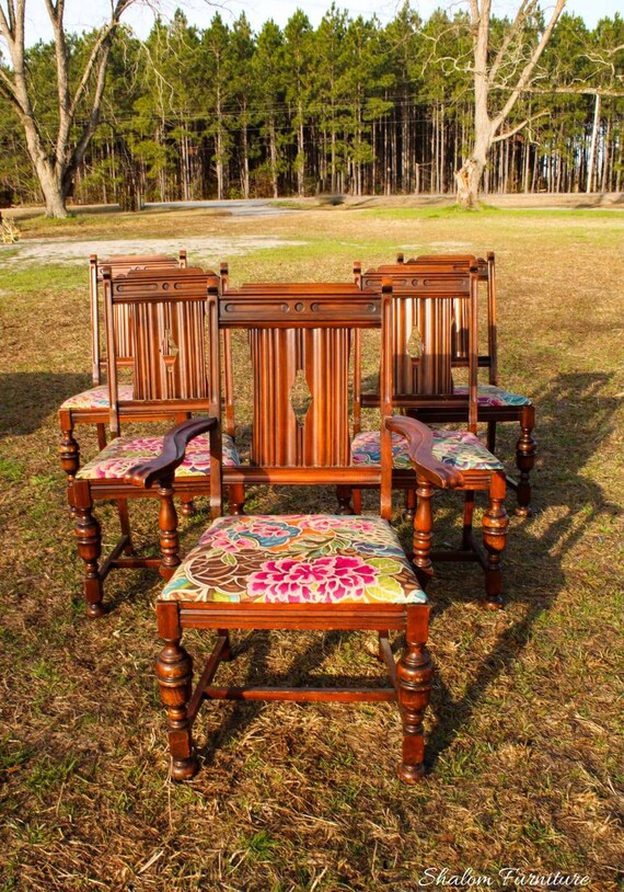 antiques Jacobean dining chairs.(1 captain chair and 4 regular chairs).5 chairs in total.