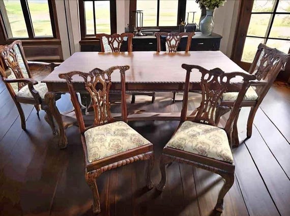 Chippendale-style dining set with antique table, 6 chairs, customizable.