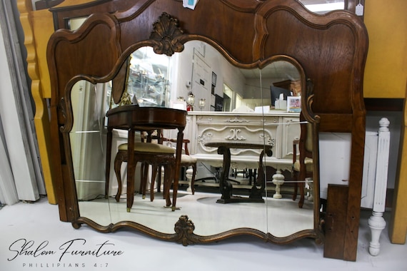 Ornate Elegance: Antique French Rococo Style Curved Wood Mirror with Beveled Glass and Exquisitely Carved Fanned Emblem