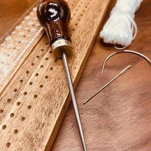 Japanese Stab Binding tool + gourd awl + waxed thread + curved & straight needles