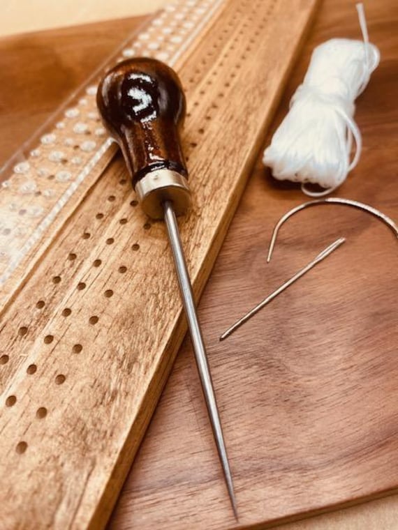Bookbinding Japanese Stab Wood Tool + gourd awl + needles + waxed thread.