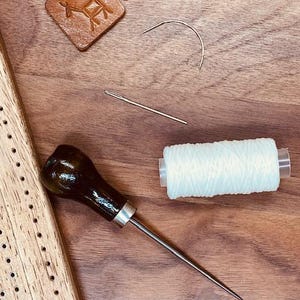 Japanese Stab Binding tool + gourd awl + waxed thread + curved & straight needles