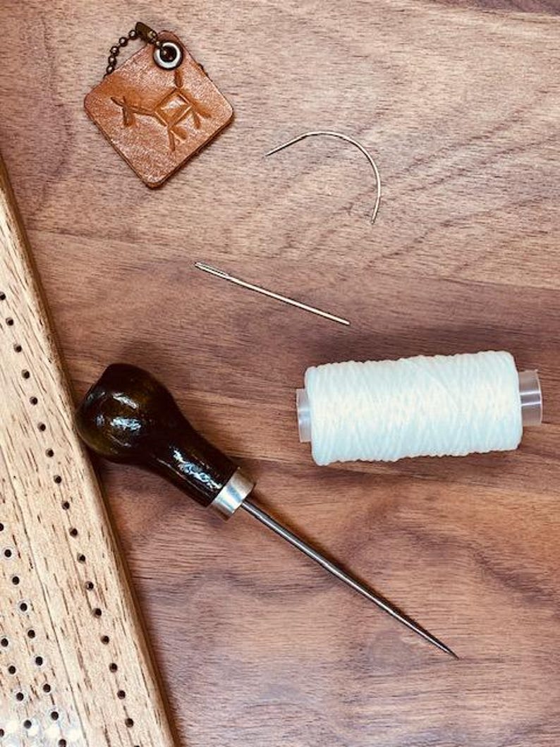 Japanese Stab Binding tool + gourd awl + waxed thread + curved & straight needles