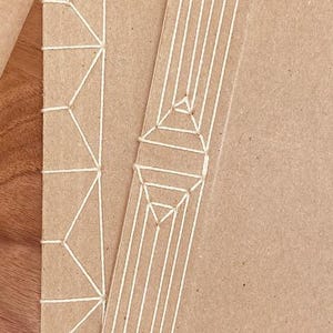 Japanese Stab Binding tool + gourd awl + waxed thread + curved & straight needles