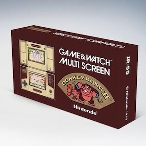 Könnte beinhalten: Eine braune Box mit einem Vintage Game & Watch Multi Screen Handheld-Spiel. Die Box trägt den Text "GAME & WATCH MULTI SCREEN" und "DONKEY KONG II" mit dem Nintendo-Logo. Das Spiel ist von 1983.