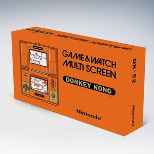 Puede incluir: Una caja naranja con el juego Game & Watch Multi Screen Donkey Kong. La caja muestra el título del juego y el logotipo de Nintendo. La pantalla del juego muestra una escena de juego de arcade clásico.