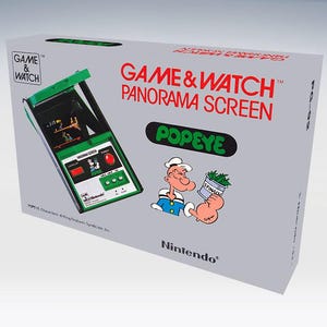 Può includere: Una console portatile Game & Watch Panorama Screen vintage nella sua scatola originale. La scatola è grigia con testo rosso e verde, con il gioco "Popeye" e un'illustrazione di Braccio di Ferro. La console è verde e nera.