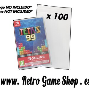 May include: A pack of 100 clear plastic sleeves for Nintendo Switch game cartridges. The text "x 100" is printed on the sleeve. The text "Juego NO INCLUIDO* Game NOT INCLUDED*" is printed at the top of the image. The image also shows a Nintendo Switch game cartridge for Tetris 99.