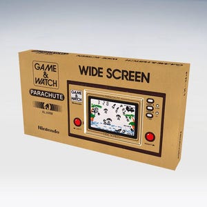 Pode incluir: Um jogo portátil Nintendo Game & Watch "Parachute" vintage na sua caixa de cartão original. A caixa é bege com texto preto que diz "WIDE SCREEN" e "GAME & WATCH". O ecrã do jogo mostra uma cena pixelizada com paraquedistas.