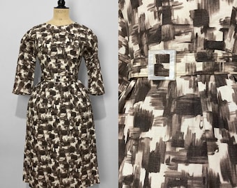 Vestido de verano vintage de tulipán con estampado abstracto de los años 50 y 50. Ropa de trabajo.